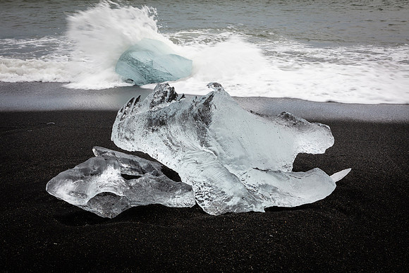 Wave Crashing Over Iceberg