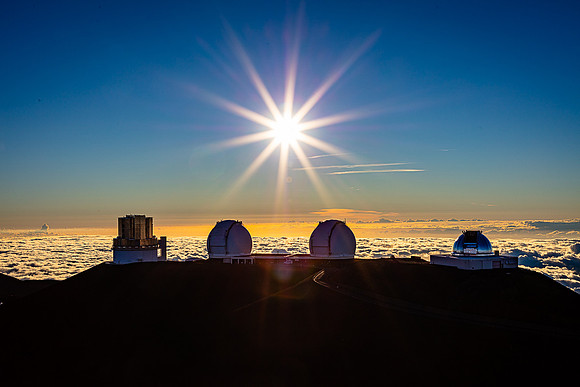 Sunstar over Muana Kea Telescopes